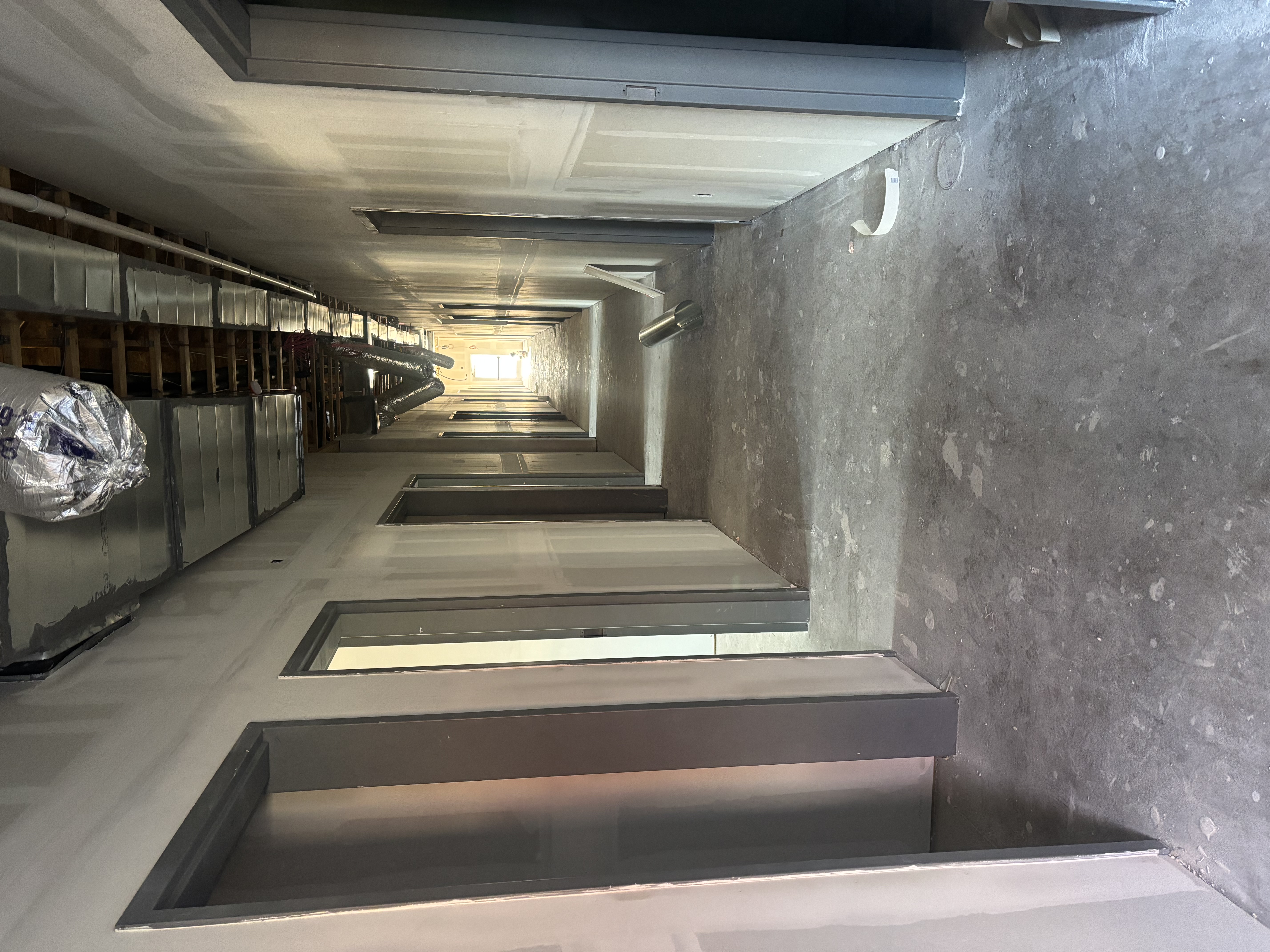 Commercial hallway transformation before A&K's work